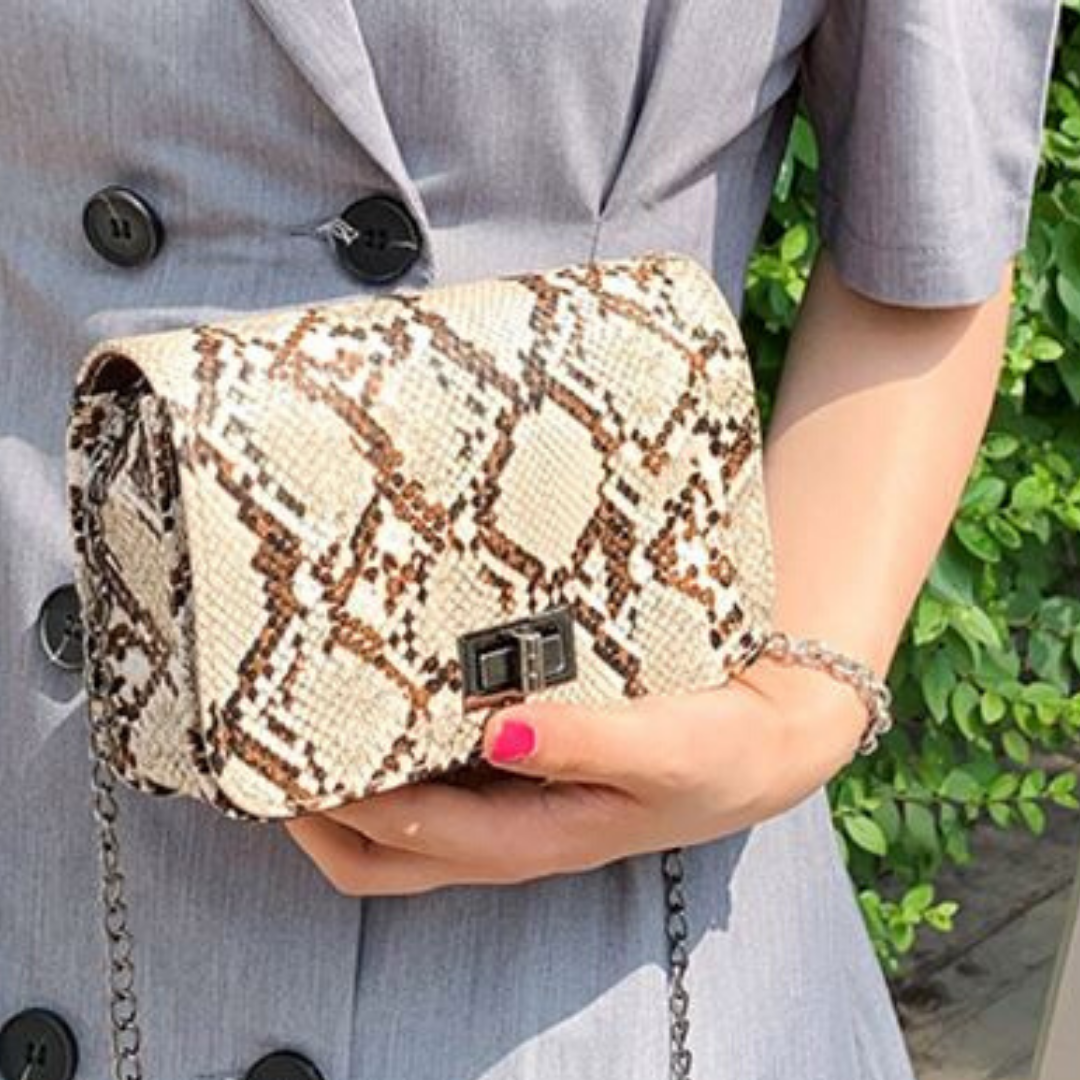 Alice Clutch by Cosmic Kollections